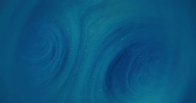 Blur paint flow. Blue marble swirl. Bright color glitter texture vibrant wet particles pigment twirl on abstract acrylic background.
