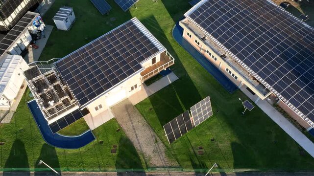 Solar Energy Research Facility with Rooftop and Ground-Mounted Photovoltaic Panels in Florian&oacute;polis, Brazil. Aerial View.