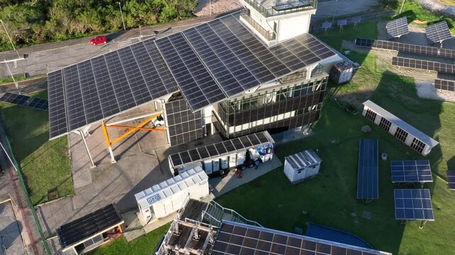 Solar Energy Research Facility with Rooftop and Ground-Mounted Photovoltaic Panels in Florian&oacute;polis, Brazil. Aerial View.