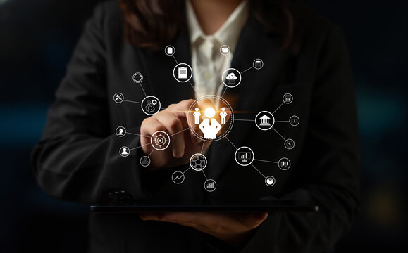 A concept of centralized business management and corporate strategy. A leadership team connecting to all functions like finance, operations, and planning. Motif