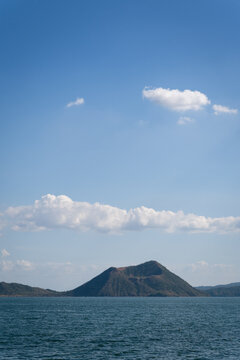 Scenic view of Taal Volcano surrounded by Taal Lake under a clear blue sky in Batangas Philippines