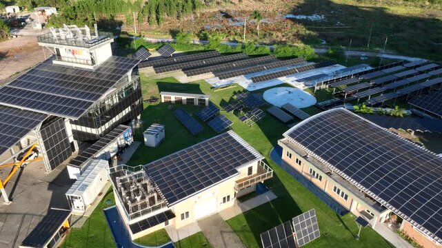 Solar Energy Technology Center with Rooftop Solar Panels, Ground-Mounted Arrays and Photovoltaic Research Systems in Florian&oacute;polis, Brazil. Aerial View.