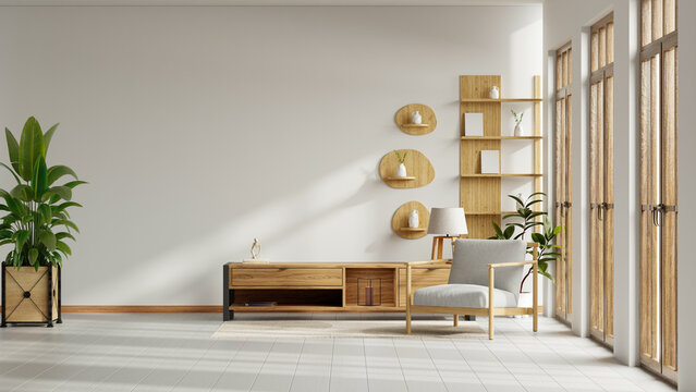 Modern minimalist living room interior with blank white wall mockup, wooden cabinet, armchair, and indoor plants- 3D rendering