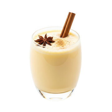 Creamy eggnog cocktail in glass with cinnamon stick and star anise garnish isolated on transparent background