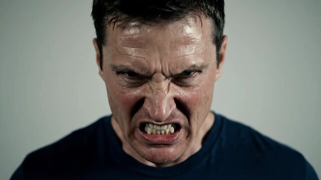 Close-up footage of male faces, close-up of male angry expressions