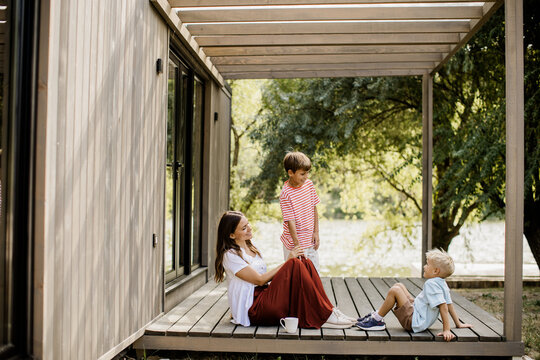 Joyful moments with family on a sunny afternoon by the lakeside