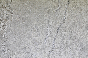 Fototapeta premium Natural white granite stone slab texture background with grey mineral veins and grains