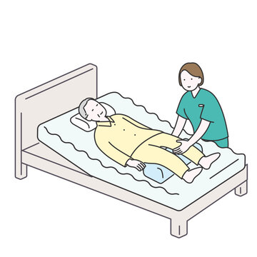 床ずれ予防のために男性高齢者の体位変換を行う介護士のイラスト