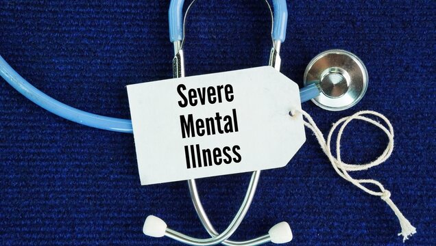 Stethoscope and paper tag with the word Severe Mental Illness. diagnosable mental, behavioral, or emotional disorder in an adult that causes severe functional impairment and limits major life activiti