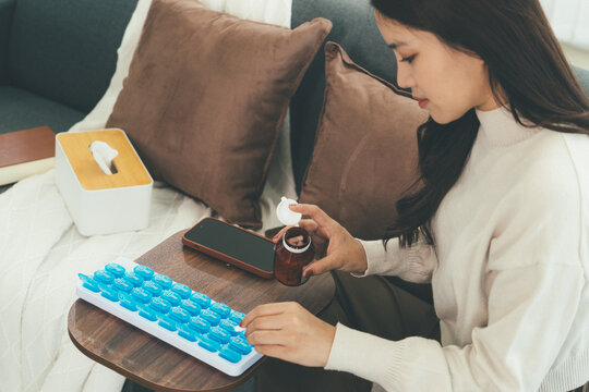 Woman Using Telehealth Service for Online Medical Consultation at Home