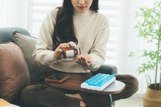 Woman Using Telehealth Service for Online Medical Consultation at Home
