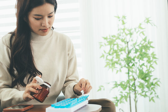 Woman Using Telehealth Service for Online Medical Consultation at Home