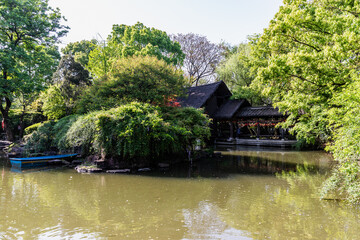 Fototapeta premium Traditional Chinese Pavilion on Waterway in Shaoxing