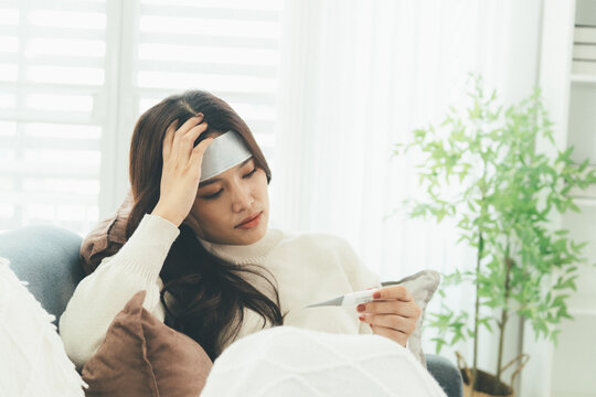 Woman Using Telehealth Service for Online Medical Consultation at Home