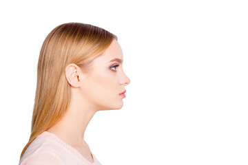 Obraz premium Half-faced profile side view close up portrait of serious confident focused concentrated thinking pondering pretty cute lovely manager wearing beige blouse isolated on gray background copyspace