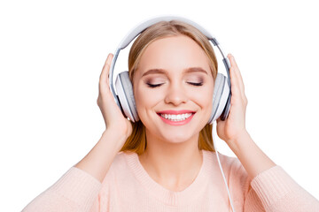 Fototapeta premium Track white sound leisure lifestyle carefree people concept. Close up portrait of excited cheerful cute lovely with toothy smile teen age girl enjoying melody on headset isolated on gray background