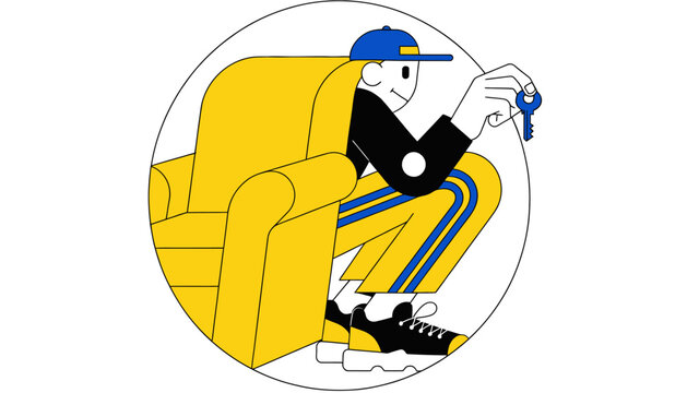 man sitting on yellow armchair holding keys
