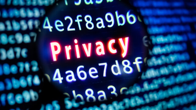 Glowing privacy word under magnifying glass with blue hexadecimal code background for cybersecurity concept.