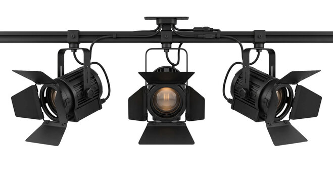 Three black stage spotlights mounted on a track with barn doors open