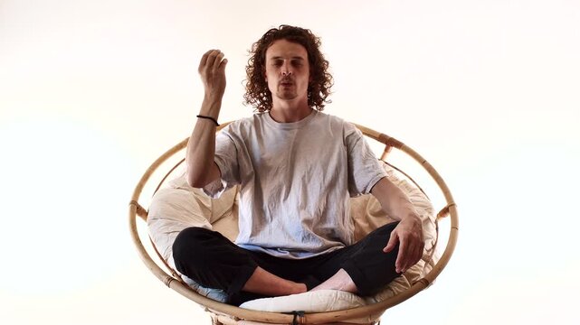 Full Body Man Meditating in Spiritual Mindfulness Pose on Circular Seat