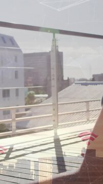 Person meditating on balcony with cityscape and Wi-Fi signal animation overlay