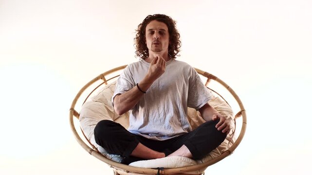 Full Body Man Meditating in Spiritual Mindfulness Pose on Circular Seat