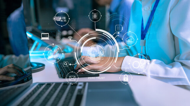 Zero trust security concept Person using computer and tablet with zero trust icon on virtual screen of Data businesses.in office.