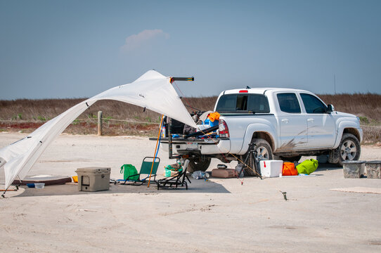 Pickup truck tailgate setup for a day of fishing