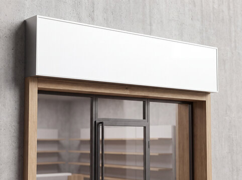 Blank storefront sign above a shop entrance mockup template