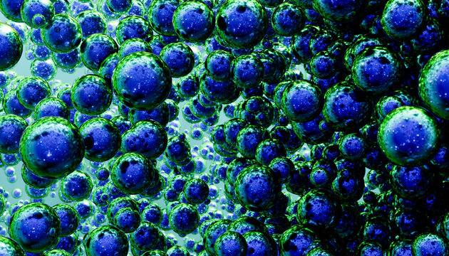 Blue bubbles with green edges clustered in macro liquid view
