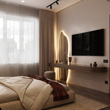 Warm contemporary bedroom with a wall mounted television, illuminated organic mirror, floating console, soft bedding and elegant ambient lighting.