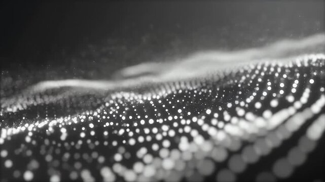Abstract digital particles forming a wave-like pattern in motion.