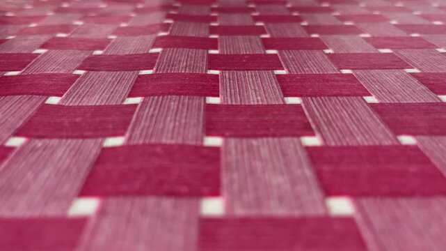 close up view of table cloth. red, pink. copy space, empty, free, negative, text, design. background, backgrounds. nobody, no people. bright, lamps, white.