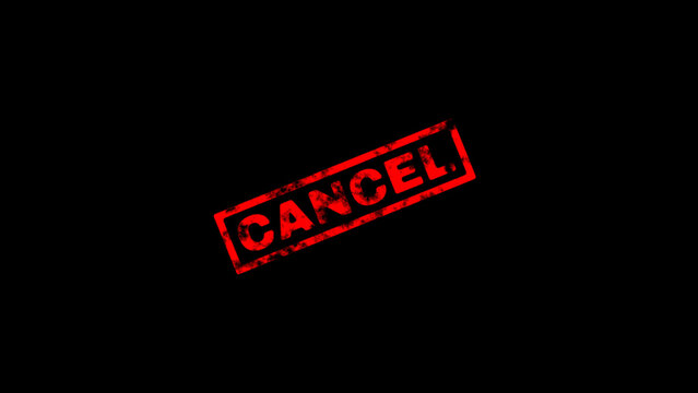 Red cancel rubber stamp mark on black background