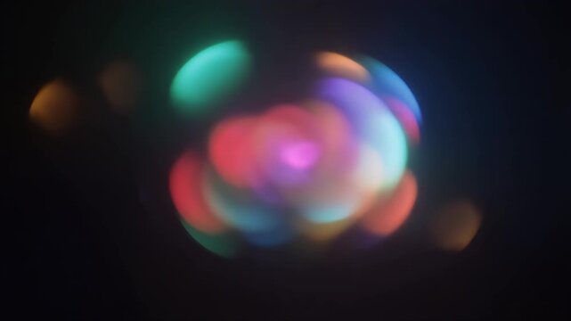 Abstract bokeh lights in various colors create a festive atmosphere.