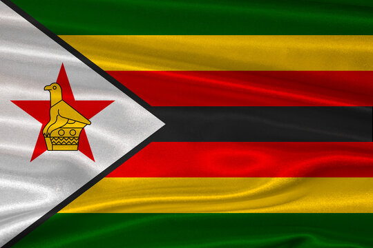 Zimbabwean flag textured with fabric background. Flag of Zimbabwe with a soft fabric texture