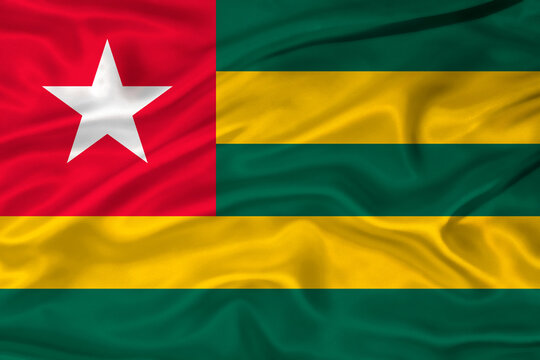 Flag of Togo with a soft fabric texture. Togolese flag textured with fabric background