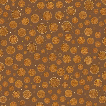 Seamless pattern of golden concentric circles and spirals on brown background