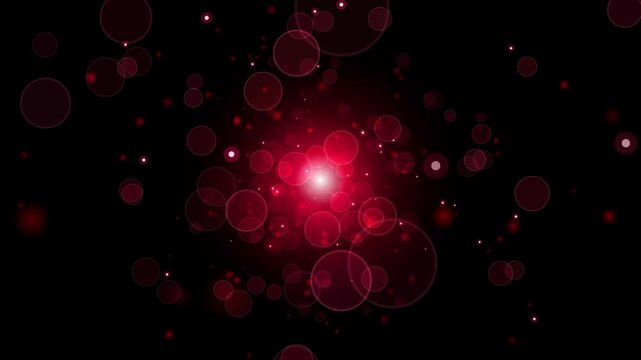 Abstract magenta red glowing bokeh particles and sparkling glitter floating on black background