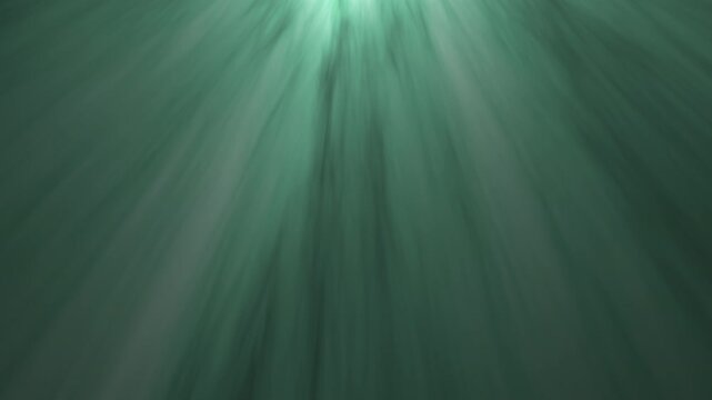 Cinematic Volumetric Light Rays Shining through Green Haze as an Ethereal Visual Overlay. 4K Video