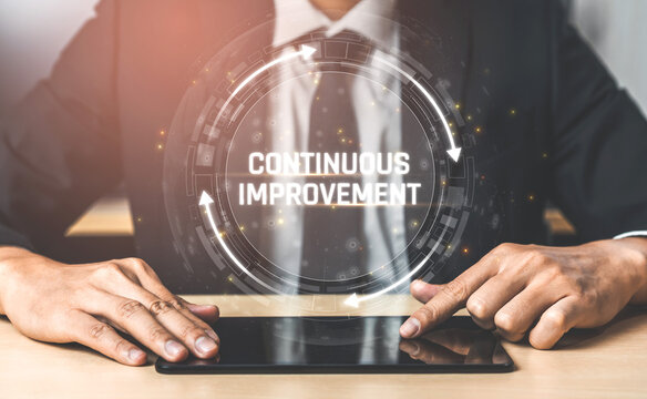 Businessman Engaging in Continuous Improvement Through Digital Technology and Innovation in a Corporate Environment Sigmoid