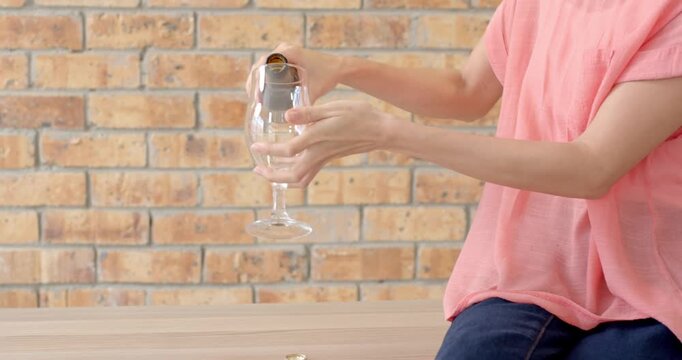 Lifestyle videos indoor of people doing activities at office, pouring beer into glass, woman enjoyin