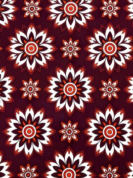 Red quatrefoil floral pattern on rustic dark fabric background for design and decor Elegant red quatrefoil motif on textured fabric.