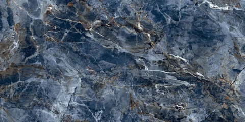 Elegant blue marble texture with soft natural veins and warm earthy tones, perfect for luxury interiors, ceramic tiles, and decorative backgrounds.   © Vidal