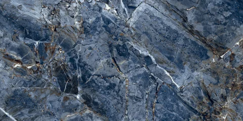 Elegant blue marble texture with soft natural veins and warm earthy tones, perfect for luxury interiors, ceramic tiles, and decorative backgrounds.   © Vidal