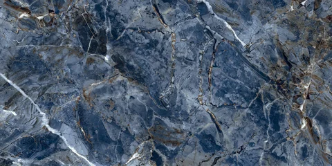Elegant blue marble texture with soft natural veins and warm earthy tones, perfect for luxury interiors, ceramic tiles, and decorative backgrounds.   © Vidal