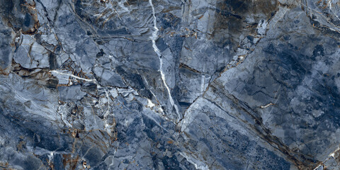 Obraz premium Elegant blue marble texture with soft natural veins and warm earthy tones, perfect for luxury interiors, ceramic tiles, and decorative backgrounds. 