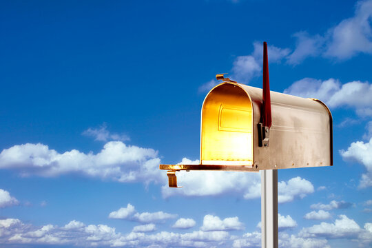 Mailbox against clouds