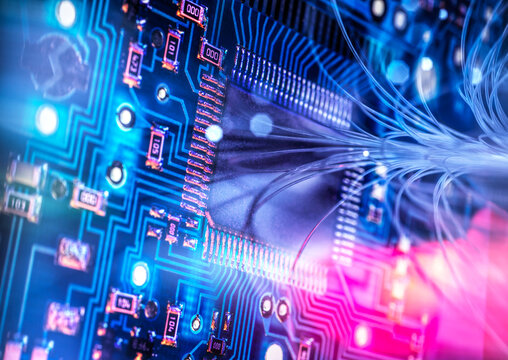 Futuristic circuit board with fiber optics and glowing microchip