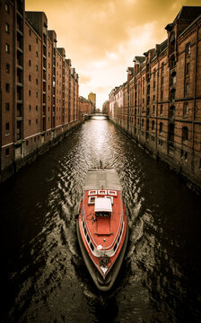 Germany, Hamburg, Hafencity, Speicherstadt, old buildiings and boat
